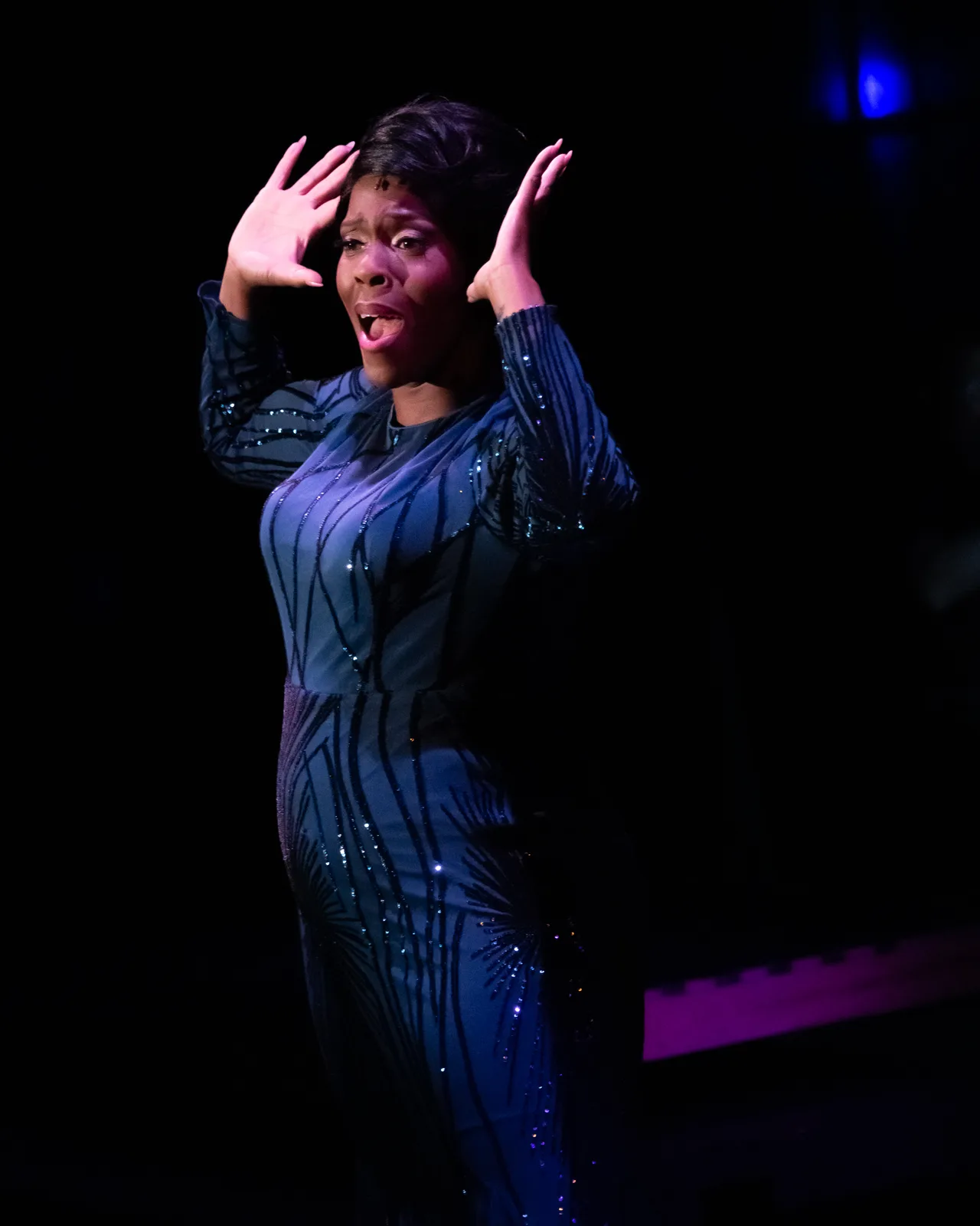 Patrece Bloomfield under a spotlight in Jerry’s Girls